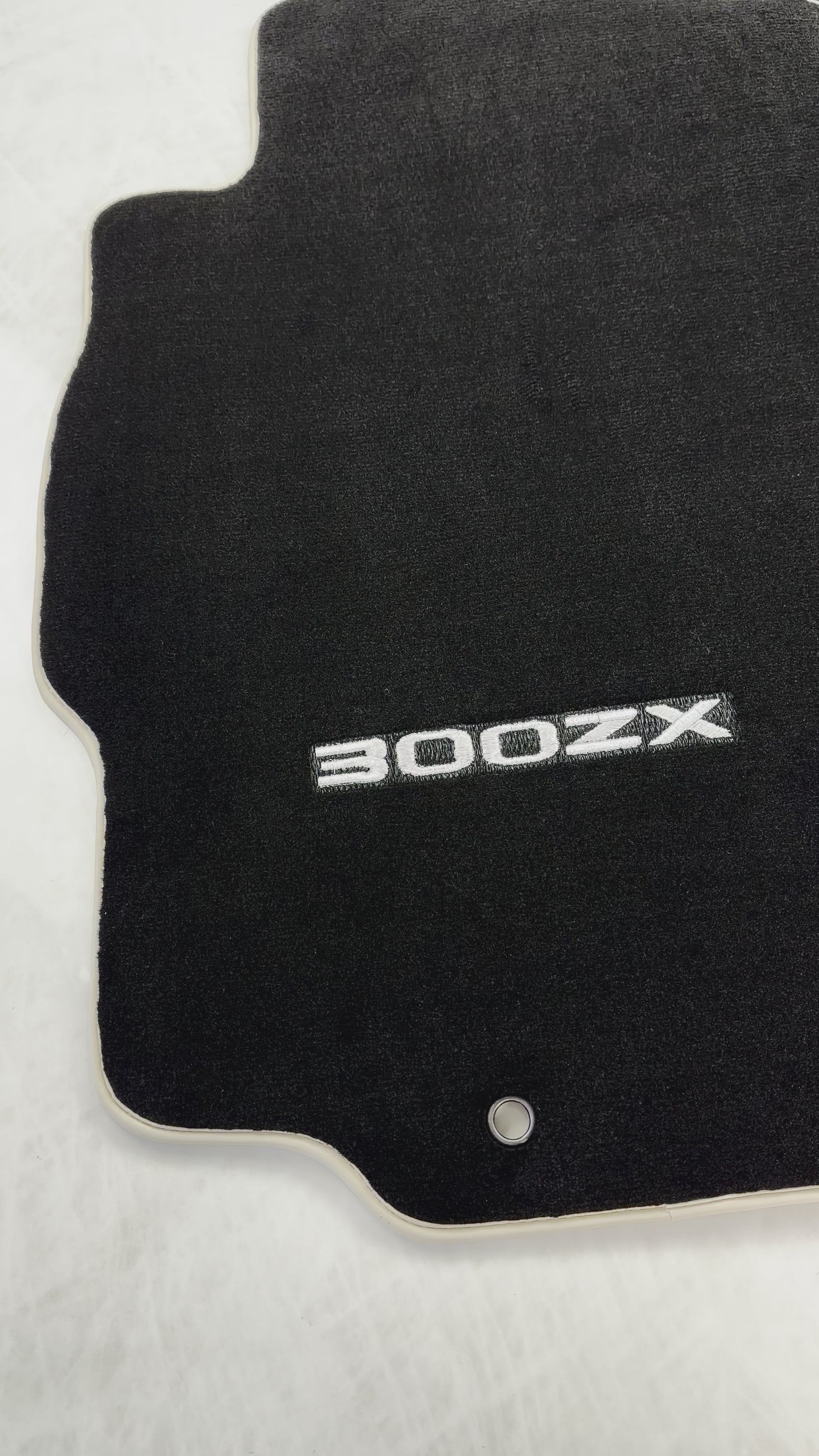 Tapetes pretos para Nissan 300ZX (1990-2000) com borda bege - AutoWin